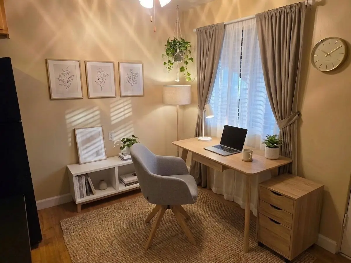 One-bedroom apartment dining area set up as a home office&mdash;virtually staged
