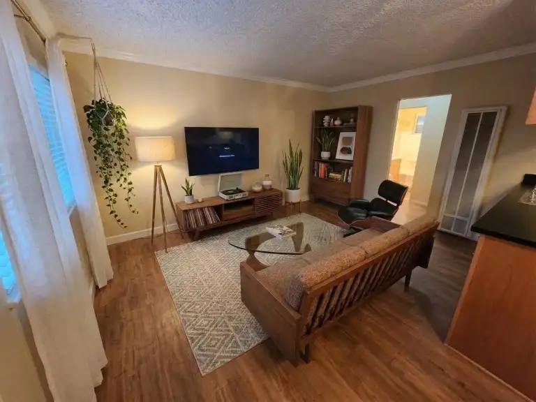 One bedroom furnished main living area (virtually staged)