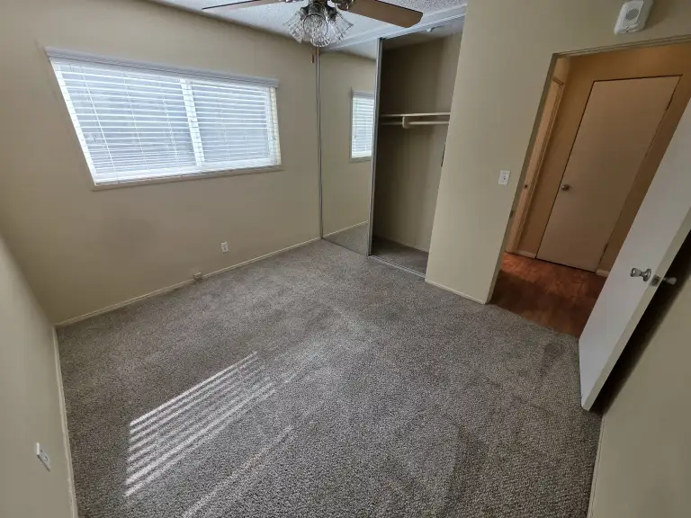 One bedroom with closet open